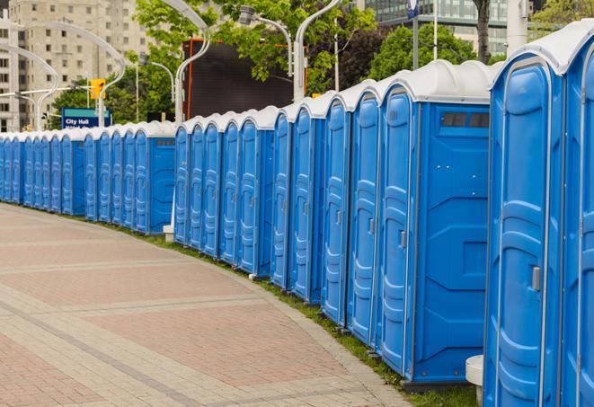 a row of portable restrooms at a trade show, catering to visitors with a professional and comfortable experience in Fountain Valley